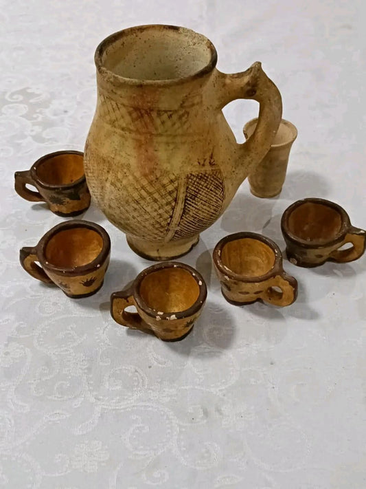 طقم قديم من صلصال طول الاناء 22cm