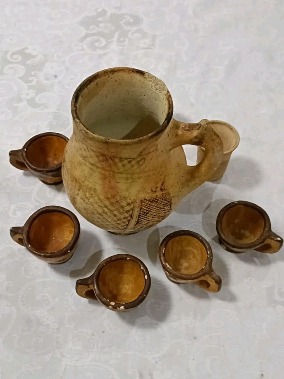 طقم قديم من صلصال طول الاناء 22cm