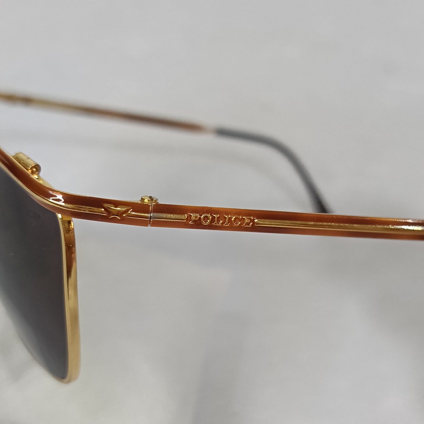 Lunette police original en plaqué or vintage