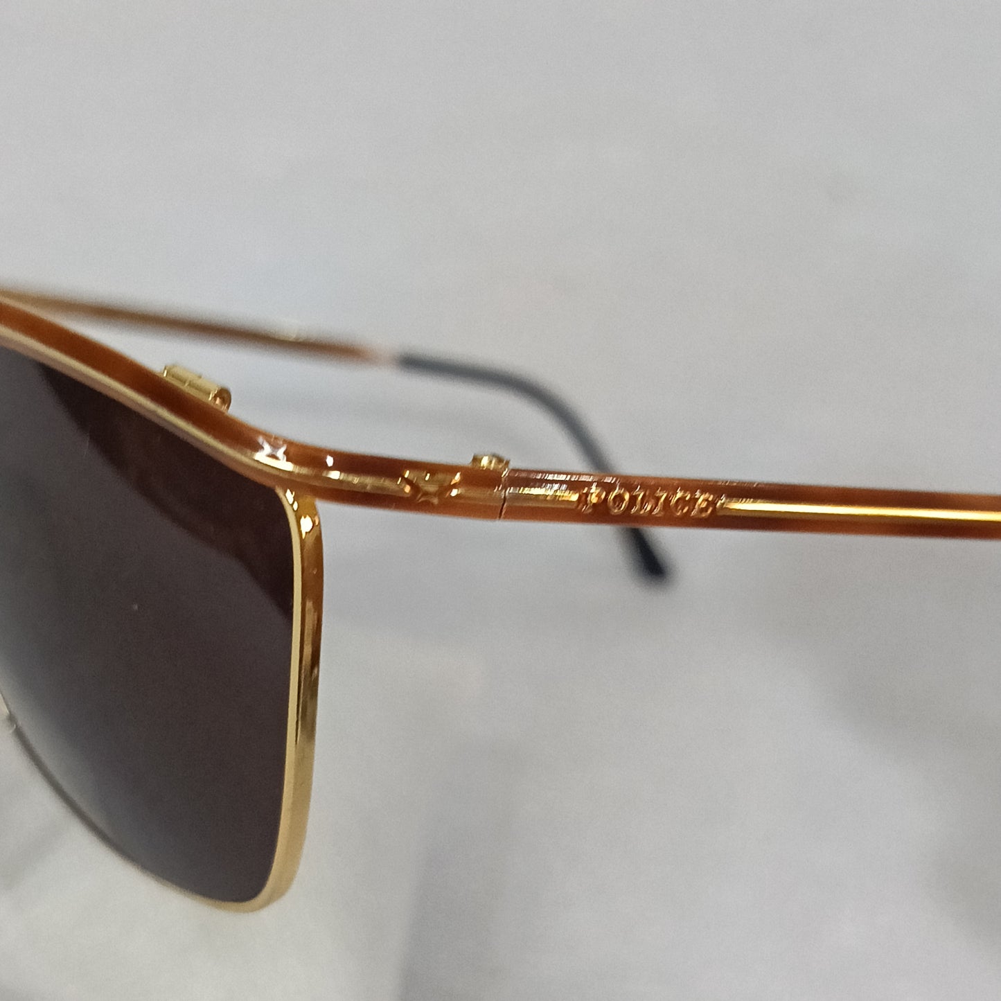 Lunette police original en plaqué or vintage