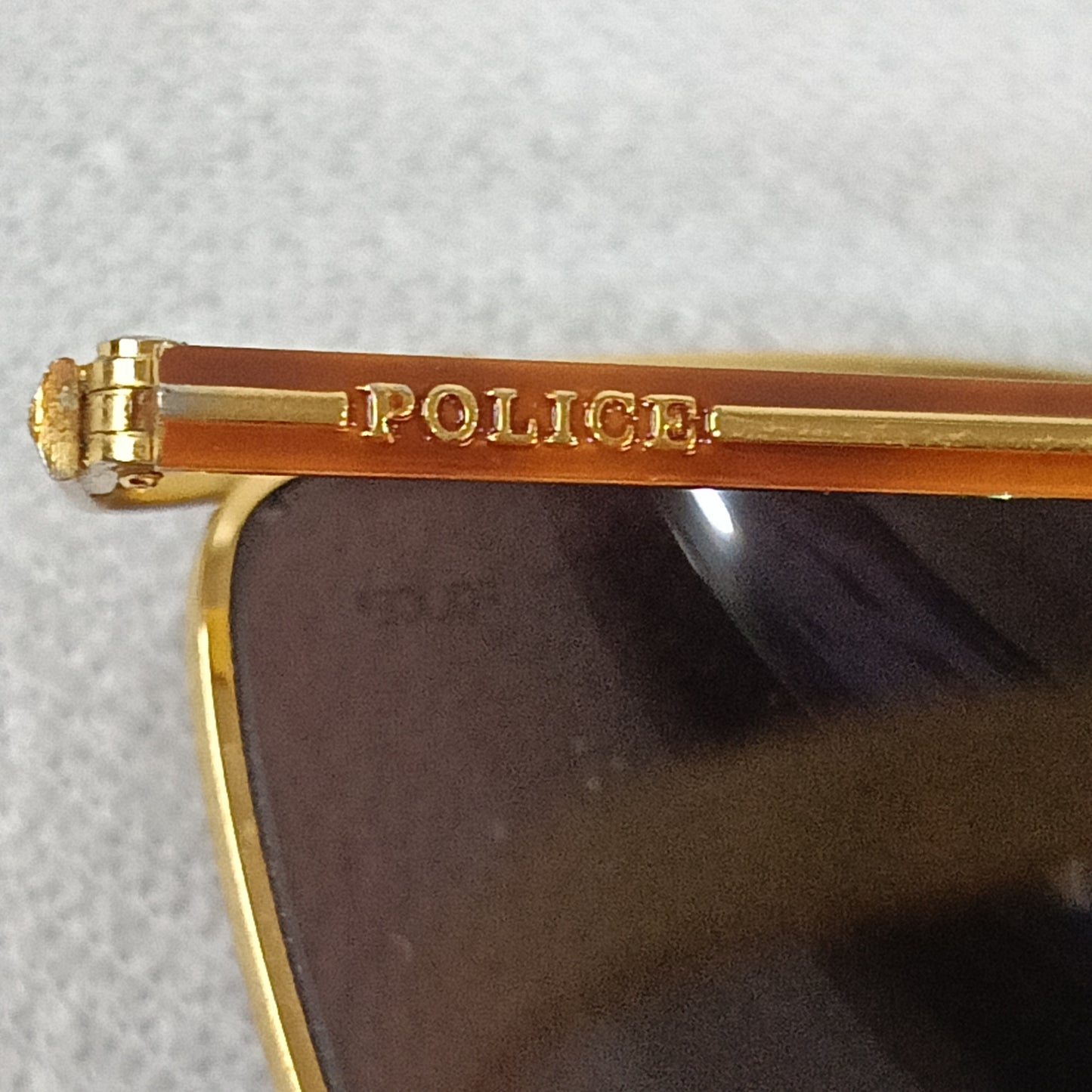 Lunette police original en plaqué or vintage