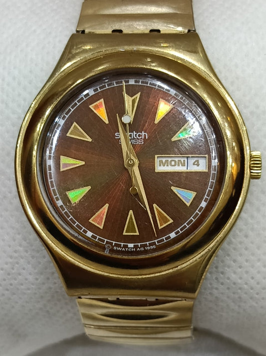 Montre swatch original plaqué or