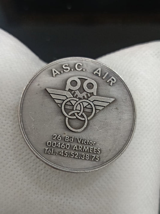 Médaille acier
