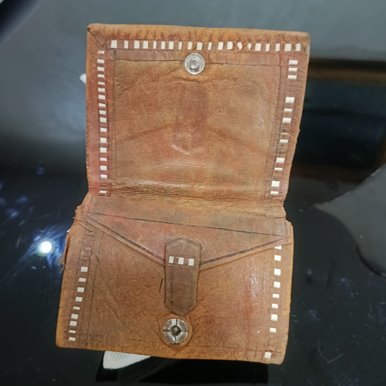 Ancien portefeuille en cuir vintage