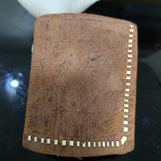 Ancien portefeuille en cuir vintage