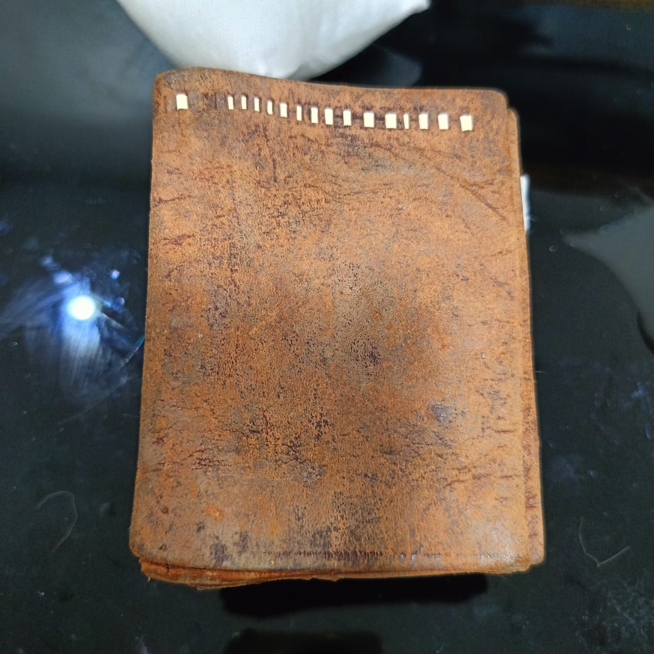 Ancien portefeuille en cuir vintage