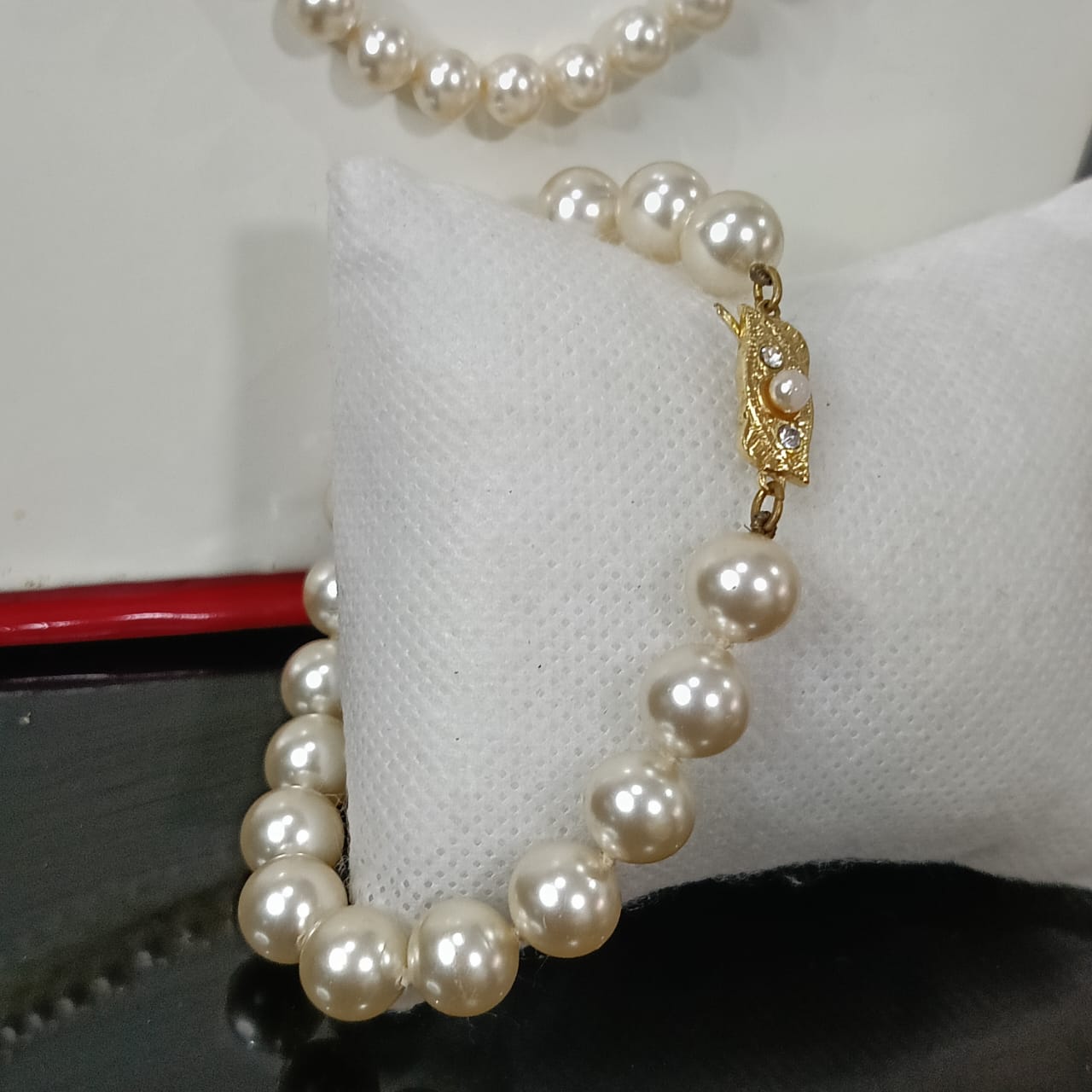 عقد وسواره من لؤلؤ اصطناعي
