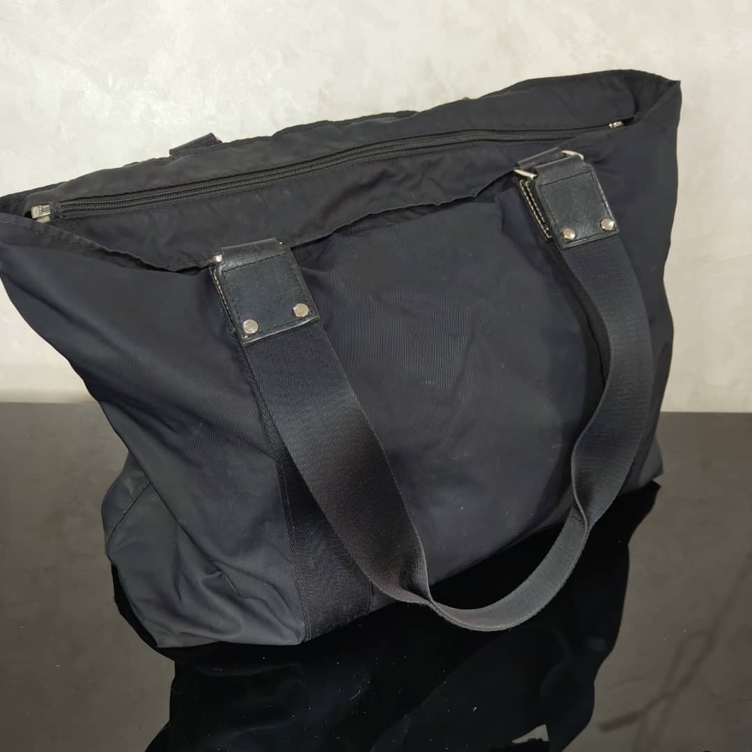Sac Longchamp en toile femme original 
45/30cm
Prix 12000