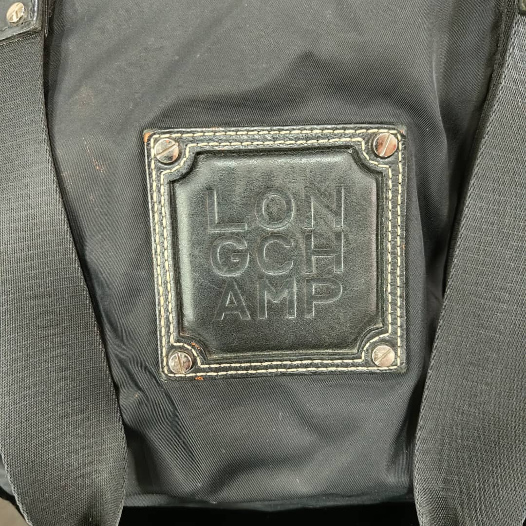 Sac Longchamp en toile femme original 
45/30cm
Prix 12000