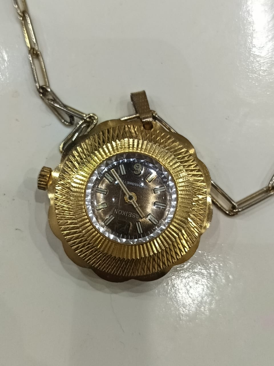 Montre gousset pendentif plaqué or