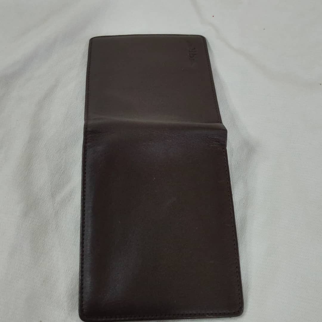 Portefeuille retier en cuir original 
23/10cm